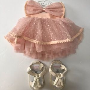 Lot of baby girl accessories. Shoes and tutu